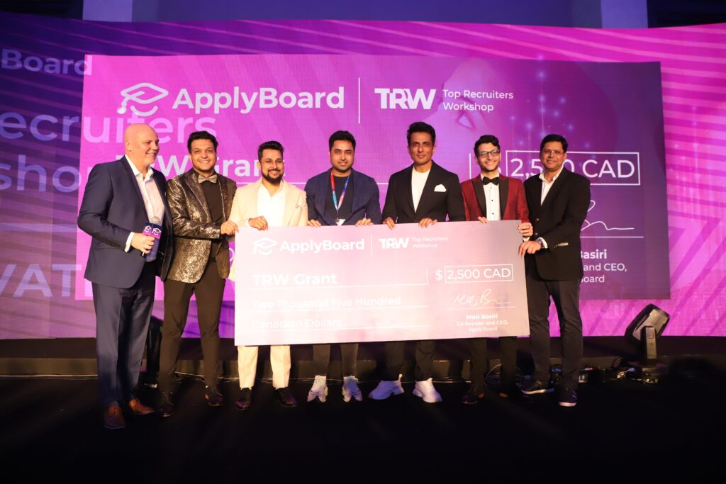 Actor and philanthropist Sonu Sood with several key members of the ApplyBoard leadership team, awarding a C$2,500 TRW student grant.