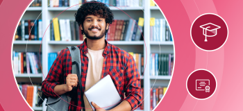 A male international student stands holding his backpack and laptop in a well-lit space with lots of books (a library or office).